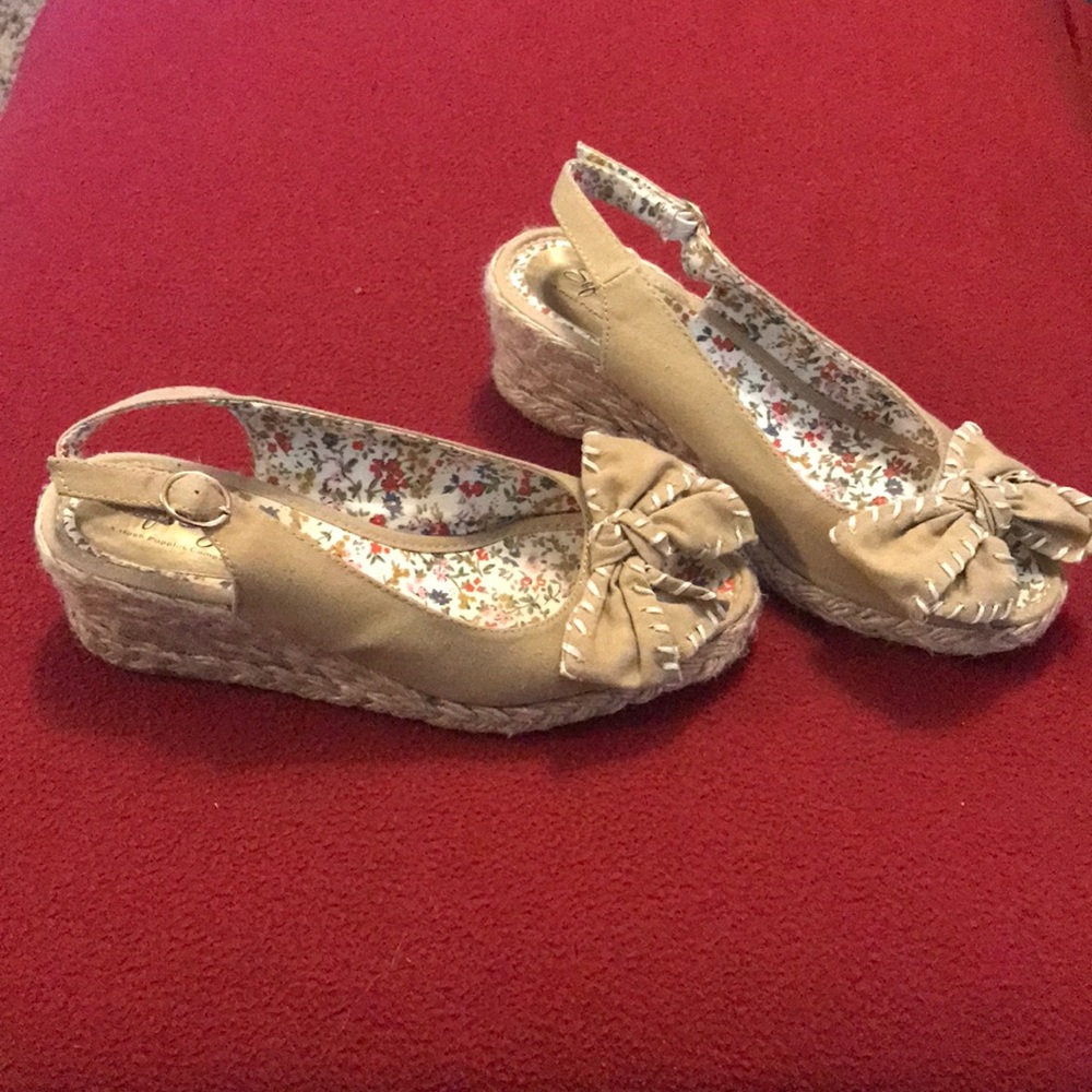 Super cute tan sandals with wedge heel